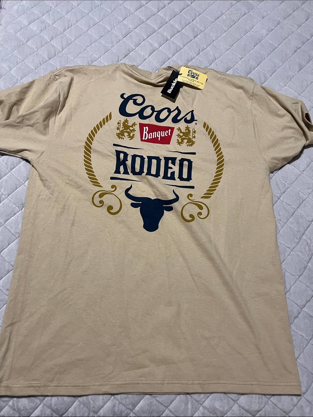 Buckle Beige Coors Rodeo Graphic Tee with Navy & Gold Accents